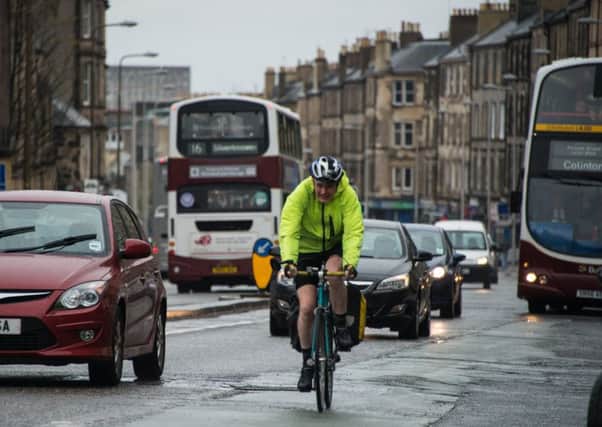 A cyclist on Leith Walk. Picture: Andrew O'Brien