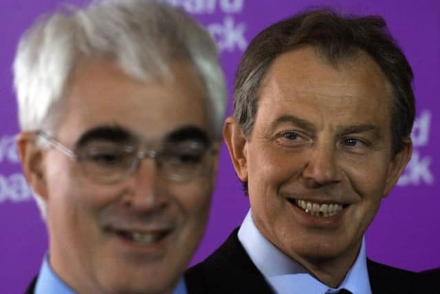 Edinburgh MP Alistair Darling speaks to local residents at the Corn Exchange in Edinburgh watched by then Prime Minster Tony Blair. Picture: PA