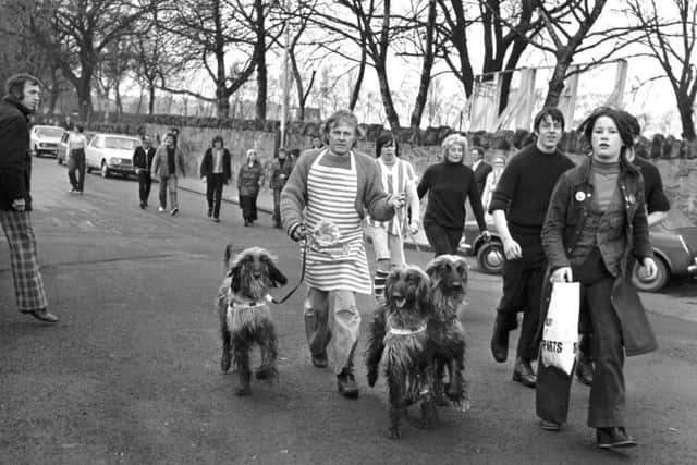 Mr Dunn and his Afghan hounds taking part in the Evening News Charity Walk in December 1975