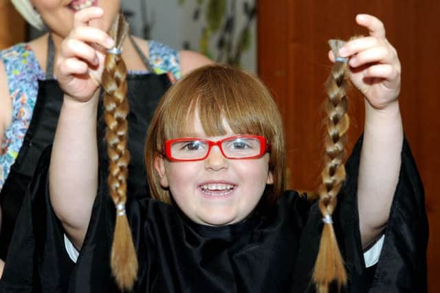 Christina Downie with her shorn locks. Picture: Lisa Ferguson