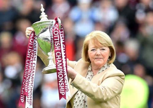 Hearts owner Ann Budge parades the Scottish Championship trophy round Tynecastle. Picture: SNS