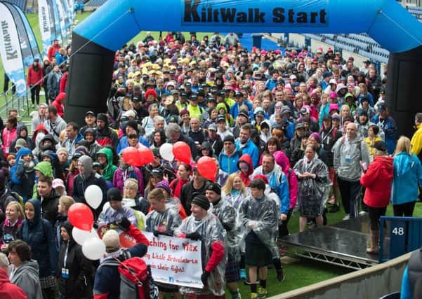 Thousands of people bracved the elements to take part in this year's Edinburgh Kiltwalk. Pic: Alex Hewitt