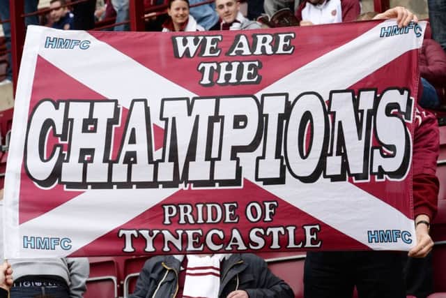 Hearts fans celebrate. Picture: SNS
