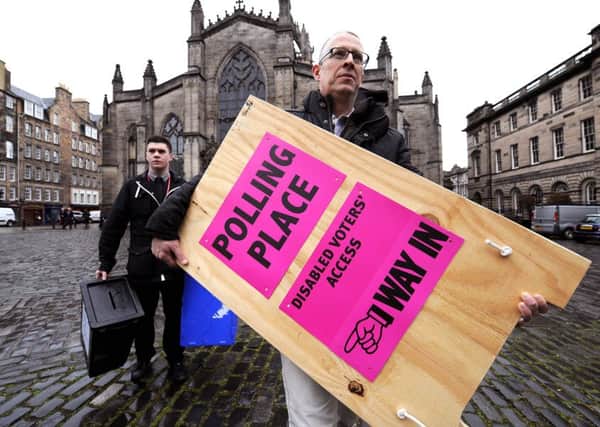 Edinburgh City Council staff make preparations for the polling station at Lothian Chambers. Picture: Lisa Ferguson