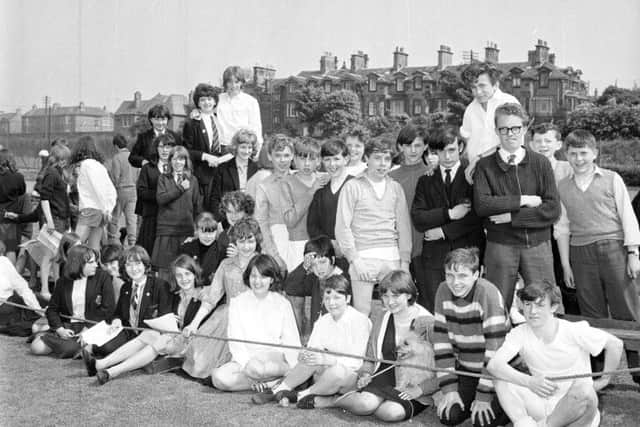 Boroughmuir School sports day at Meggetland in 1965  - a group of children watching the races
