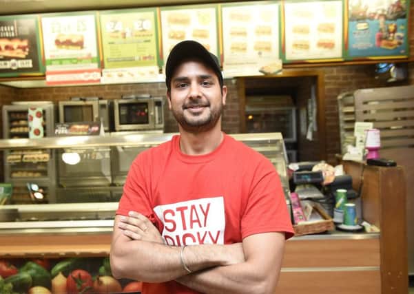 Subway worker Karanvir Johal wrestled thief to the ground, then sat on him to prevent his escape. Picture: Greg Macvean
