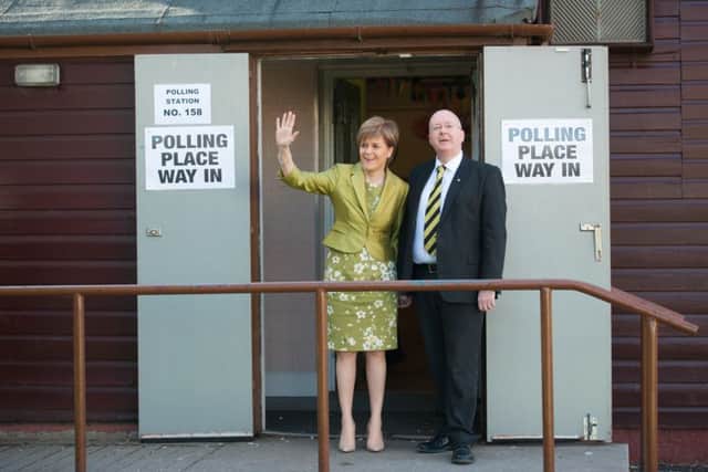 First Minister Nicola Sturgeon and her husband Peter Murrell cast their vote in Glasgow. Picture: John Devlin