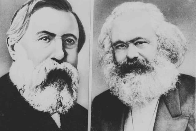 Karl Marx, right, and Frederick Engels, left, authors of The Communist Manifesto. Picture: AP
