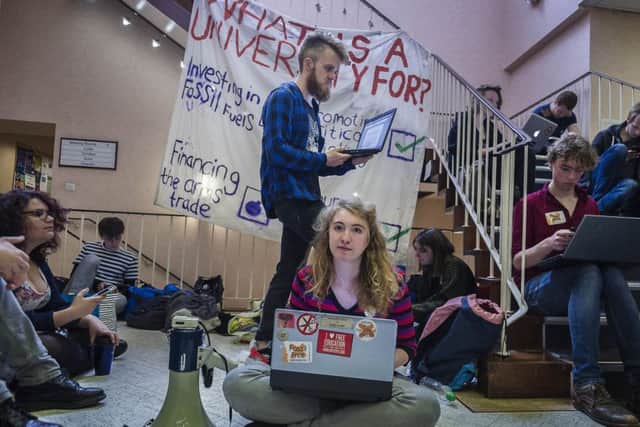 Students hold a sit-in protest at Charles Stewart House. Picture: Scott Taylor