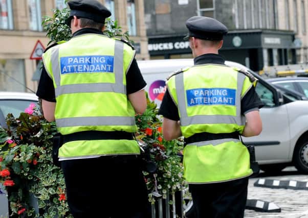 A total of 230,000 penalty charges were issued in Edinburgh over 2013-14. Picture: Lisa Ferguson