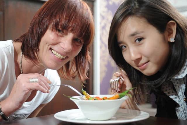 2011 Kurry Queen Beverley Jones and runner-up Curie Kim with the Kismot Killer which left Curie hospitalised. Picture: Dan Phillips