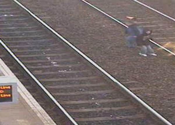 CCTV footage of young boys playing on the tracks at Wester Hailes station in Edinburgh. Picture: PA
