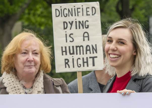 Campaigners outside the Scottish Parliament. Picture: Ian Rutherford