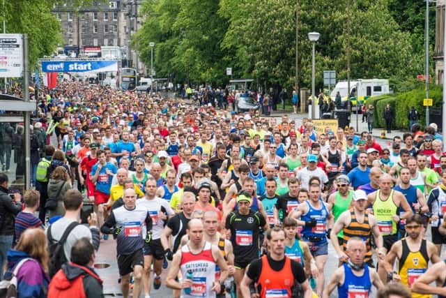More than 3000 athletes, including charity fun runners, took part in the 26.2-mile road race. Picture: Ian Georgeson