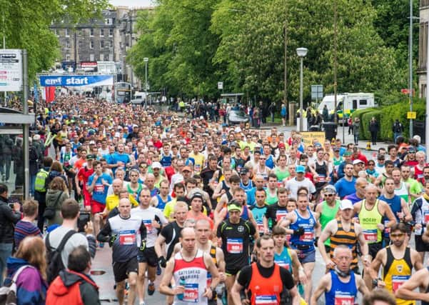 More than 3000 athletes, including charity fun runners, took part in the 26.2-mile road race. Picture: Ian Georgeson