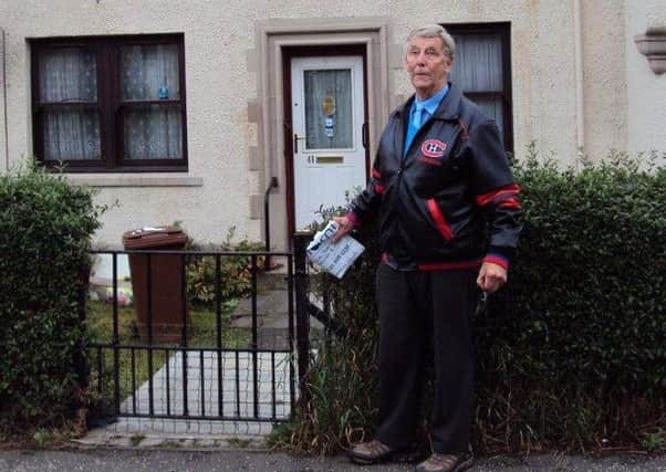 Murray Lawrie outside his childhood home in James Lean Avenue, Dalkeith
