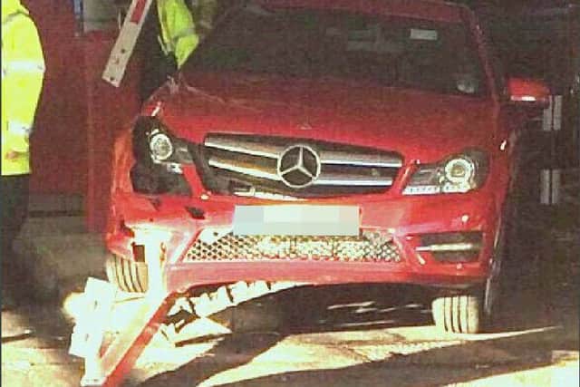 The barrier was wrecked when a motorist tried to pick up a dropped coin and accidentally put his vehicle in gear. Picture: Twitter