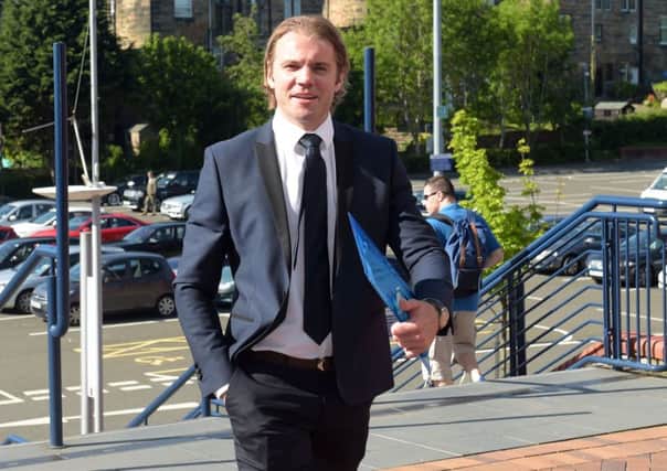 Robbie Neilson arrives at Hampden for his hearing this morning. Pic: SNS