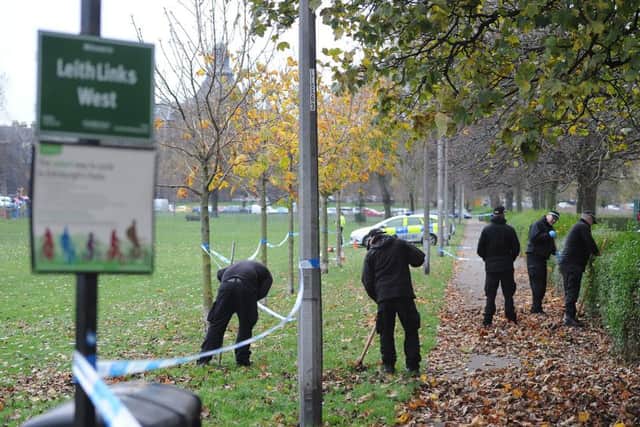 Police scour Leith Links for clues following the incident. Picture: Neil Hanna