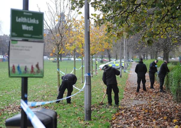 Police scour Leith Links for clues following the incident. Picture: Neil Hanna