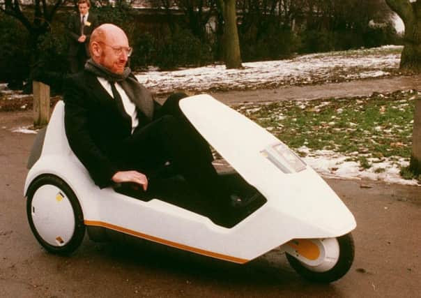 Sir Clive Sinclair in his C5. Picture: PA