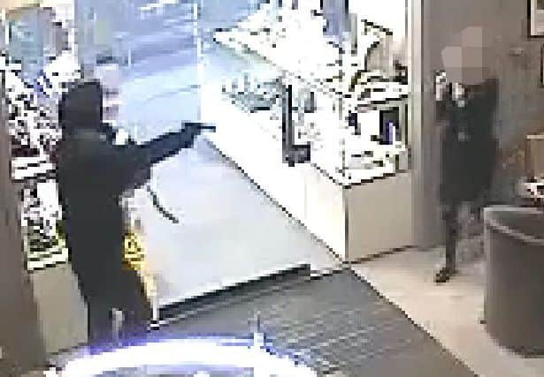 CCTV of Matthew Ferry robbing the Laing's jewellers shop, in Frederick Street.
