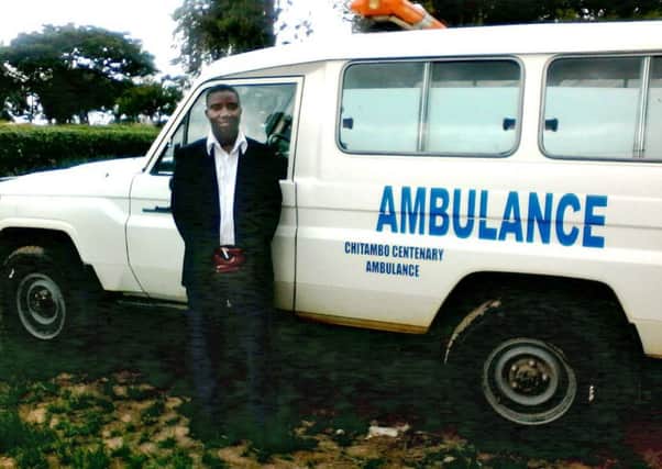 Levi Chifwaila with the Chitambo ambulance