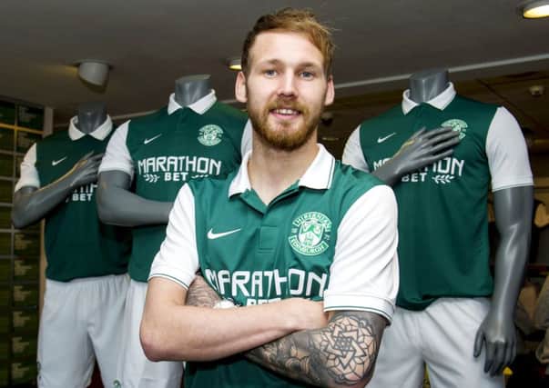 Martin Boyle, still recovering from a serious knee injury he sustained in early May, is confident Hibs can finish top of the pile in the Championship next term. Picture: SNS