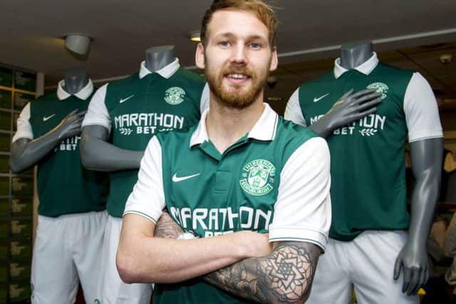 Martin Boyle, still recovering from a serious knee injury he sustained in early May, is confident Hibs can finish top of the pile in the Championship next term. Picture: SNS