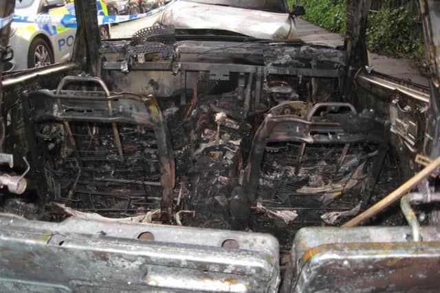 The cars were left gutted. Picture: John Wallace