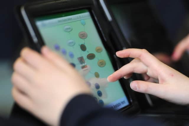 iPads have been issued to some city school pupils. Picture: Dan Phillips