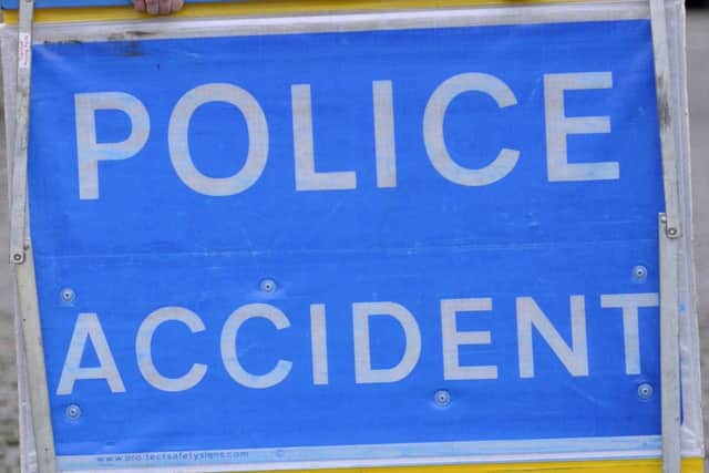 A woman has been taken to hospital. Picture: John Devlin
