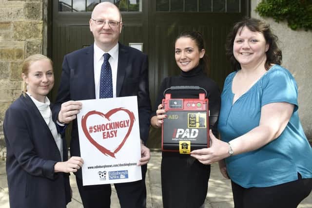 Katherine Newlands, David Ferguson, Lara Okan and Estelle Hollis from Crown Estate with their new defibrillator. Picture: Greg Macvean