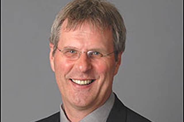 Sir Peter Housden