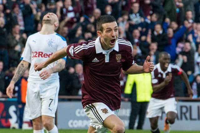 Jason Holt celebrates scoring against Rangers last season. Pic: Ian Georgeson