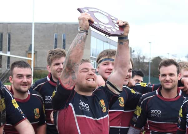 Darren Eales holds the Regional Bowl shield aloft in 2014. Picture: comp