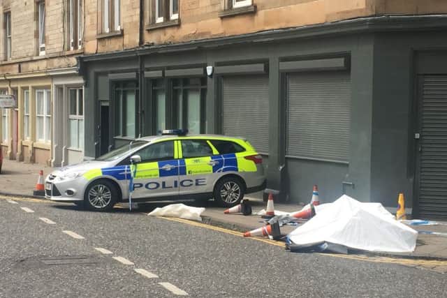Police attend the scene of the incident in Edinburgh's Albert Street. Picture: Contributed