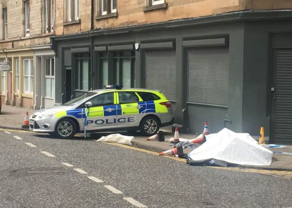 Police attend the scene of the incident in Edinburgh's Albert Street. Picture: Contributed