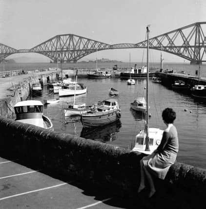 The harbour at South Queensferry with the Forth Bridge in the background in May 1971. Picture: TSPL