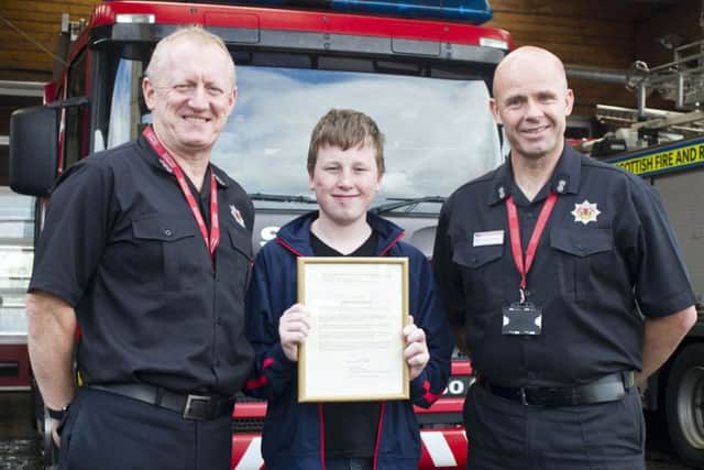 Station manager Martyn Brandrick, Stuart Watson and watch manager Brian Robertson. Picture: Scottish Fire and Rescue Service