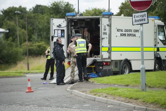 Police at the scene in Newbridge. Picture: TSPL