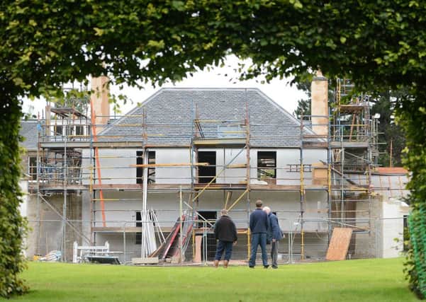 The cottage takes shape in the Botanics. Picture: Neil Hanna