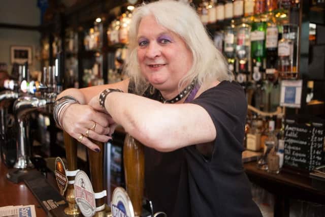 Michelle McDonaugh behind the bar at Sandy Bells. Picture: Toby Williams