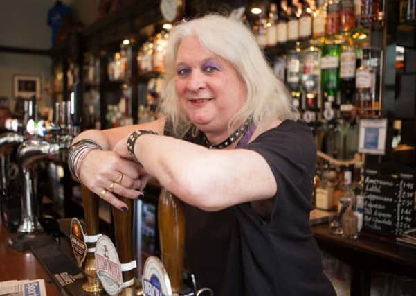 Michelle McDonaugh behind the bar at Sandy Bells. Picture: Toby Williams