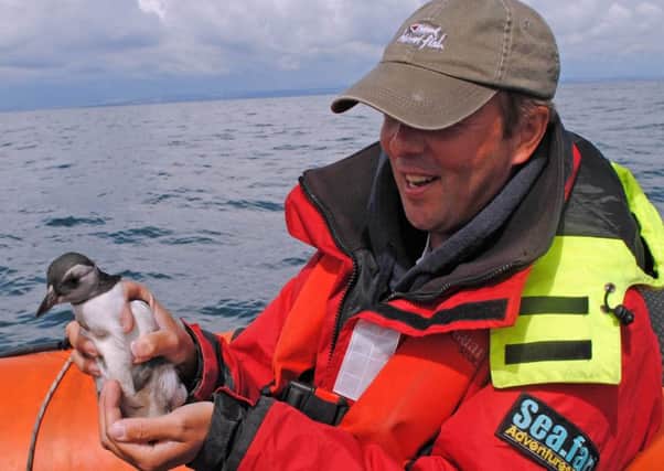 James Leyden with Polly the puffling