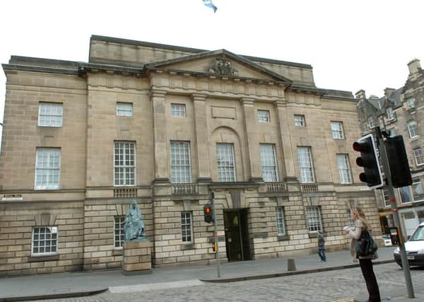 The High Court in Edinburgh head Mark Black  left Gillian Petrie covered in blood. Picture: Bill Henry
