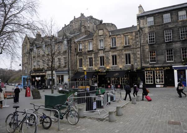 The Grassmarket in Edinburgh. Three football fans have been jailed and given football banning orders for their part in disorder that took place in April. Picture: Greg Macvean