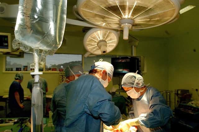 The flow of patients coming in and out of surgery is routine stuff for the professionals