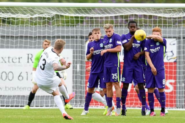 Dumbarton's William Gibson fires home the game's winning goal from a free kick. Picture: SNS