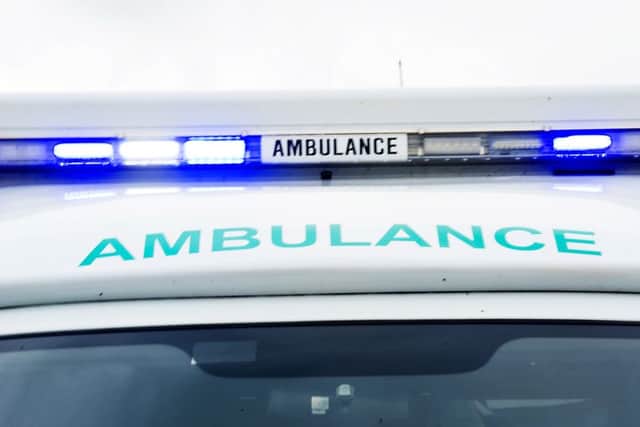 A woman was taken to hospital after being rescued from a fire at her home. Picture: John Devlin